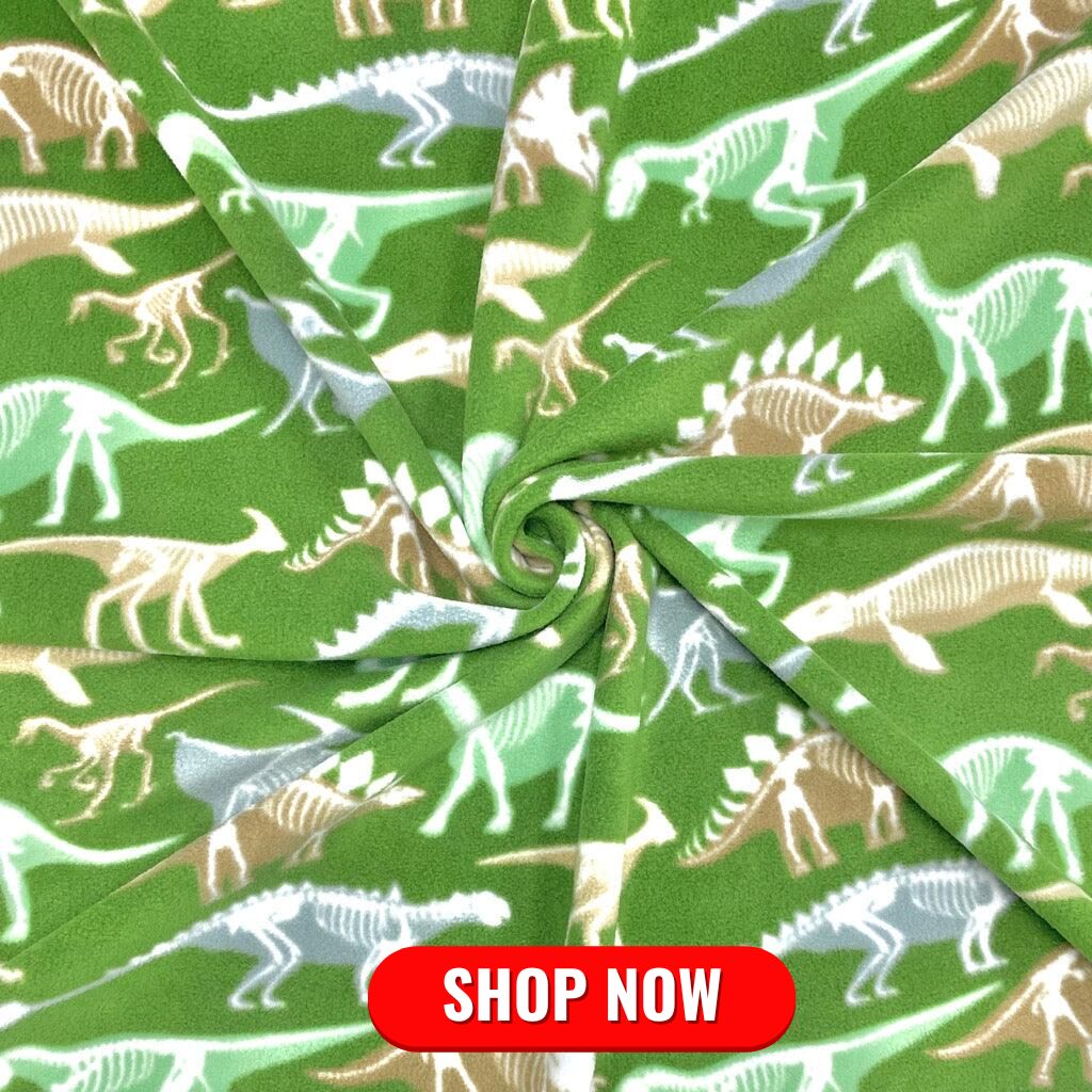 Dino Skeletons on Green Anti Pill Polar Fleece Fabric