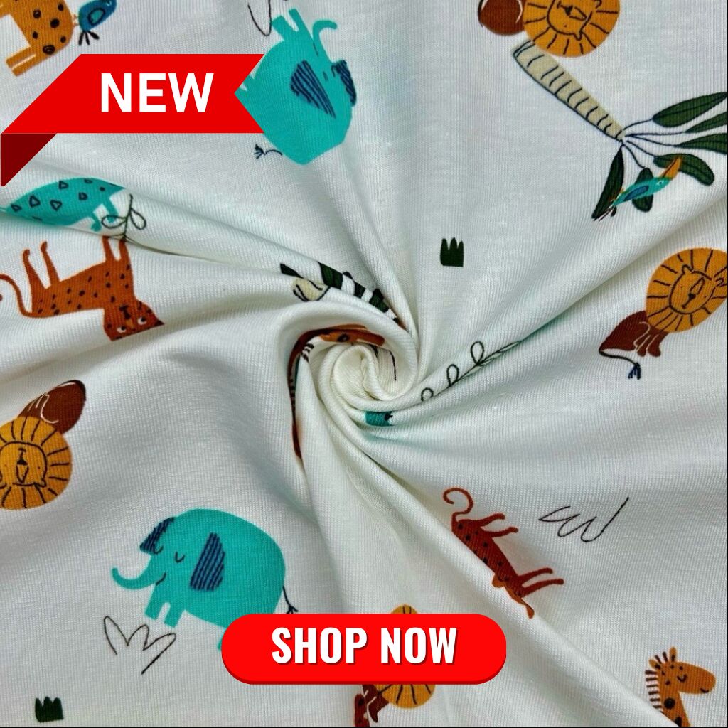 Jungle Animals on Ivory Cotton Jersey Fabric